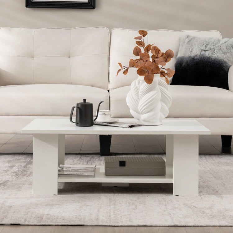 Large 36-inch modern coffee table with storage shelf, featuring a sleek white design for versatile living room use.
